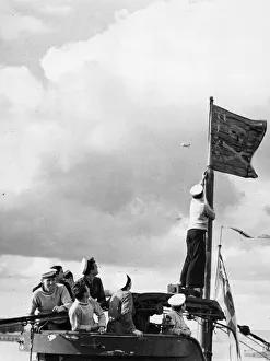 Flags Prints: British Royal Navy submarine HMS Unbroken returns home to Portsmouth