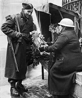 On Leave Prints: A British soldier buying flowers for his wife in central London as he returns home