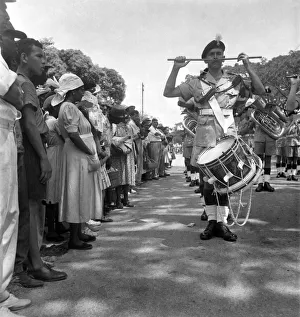 British soldiers marching in Georgetown, British Guiana watched by local citizens