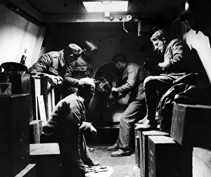 British soldiers seen here serving one of the large artillery pieces on an armoured train