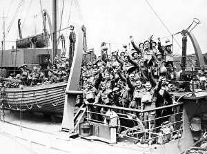 00166 Collection: British Soldiers smiling and waving on board a troop ship as they sail to join