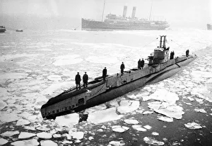 Marine Prints: A British submarine noses its way through ice covered waters off the East Coast of