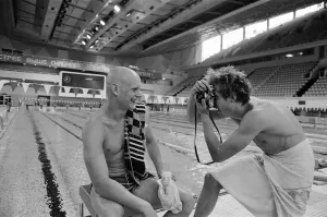 British swimmer Duncan Goodhew poses for pictures by the Olympic Swimming Pool in Moscow