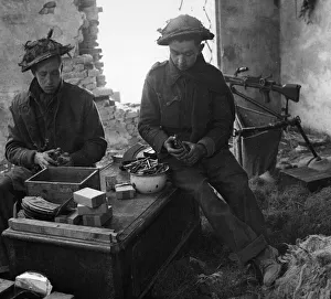 01463 Prints: British troops of the 8th army have cleared several pockets of enemy resistance
