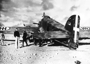 00152 Prints: British troops examine the wreckage of an Italian S79 aircraft which landed on the edge