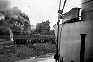 D Day Prints: British troops under fire on Juno beach at Normandy shortly after the D-Day landings
