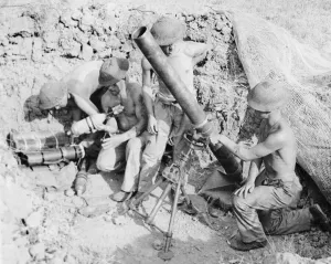 01444 Prints: British Troops loading up mortar with bombs during Second World War in desert