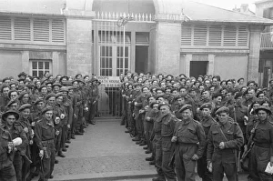 British troops outside the bath house in an unknown Normandy town in Northern France a