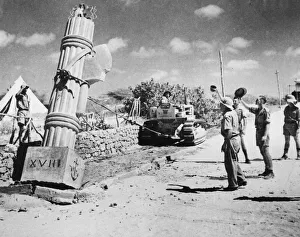 British troops removing a fascist sign in Kismayu during Second World War