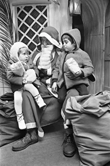Suspicious Prints: Brother and sister meet Father Christmas in his Grotto at Wellsteed department store in