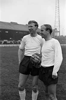 Brothers Jack Charlton (l) and Bobby Charlton (r) pose for pictures ahead of training