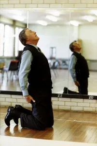 00504 Prints: Bruce Forsyth TV Presenter and Comedian exercising in gymnasium