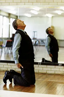 00504 Prints: Bruce Forsyth TV Presenter and Comedian exercising in gymnasium Mirrorpix
