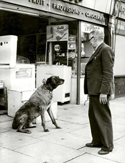 Bruce the shop dog is passed on to a new owner as Arthur Turner retires from