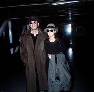 Bruce Willis with wife Demi Moore arriving at London Airport October 1987