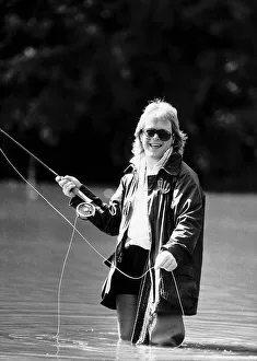 Bruno Brookes Disc Jockey practices his fly fishing in one of the ponds near his home in