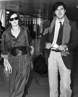 00055 Prints: Bryan Ferry Pop Singer With Wife At Heathrow Airport gqmagazineusa gqmagazineusa