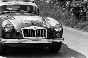 01298 Prints: Bryan Halladay from Warwick in a bright red 1962 MGA which he will be driving in