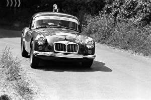01298 Prints: Bryan Halladay from Warwick in a bright red 1962 MGA which he will be driving in