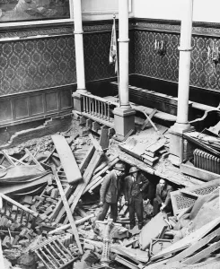 Wreckage Prints: BUCKINGHAM PALACE BOMBS. Officials of the Palace looking at the wrecked