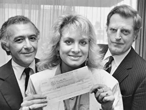 Former Bucks Fizz singer Jay Ashton donating a cheque for £