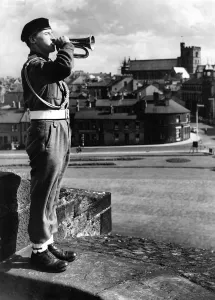 Core07 Prints: A bugler sounds reveille over the silent city of Carlisle the home of the Border Regiment