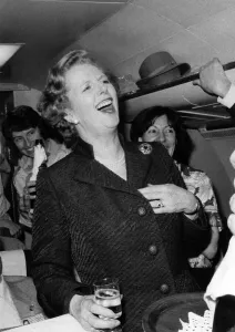 Buoyant. Mrs. Thatcher on polling day eve with the Party faithful. June 1983 P009158