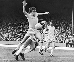 Burnley v. Leeds. Leeds United player Trevor Cherry sends Ray Hankin flying