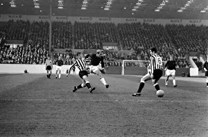 Burnley v. Newcastle. Burnley forward Ralph Coats bursts past Newcastle