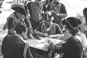 Military Army Prints: Burt Lancaster playing cards with his actor colleagues during the filming of The Devils