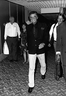 Burt Reynolds Actor arriving at Heathrow Airport from New York to open the Harrods Sale