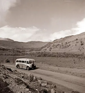 Core53 Prints: A bus journey in the highlands of Scotland circa 1950s transport road rural