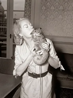 00146 Prints: Bush Babies at Crystal palace Zoo Woman kissing Bush Baby November 1958
