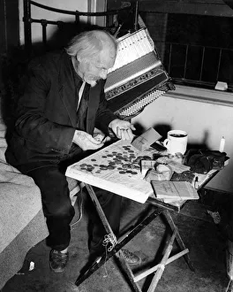 Busker Prints: Buskers: Each night in his lonely bedroom, Gus Andrews counts the receipts for the day