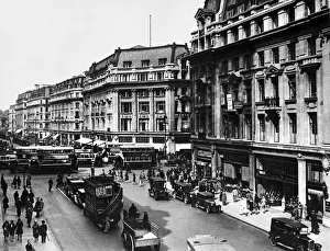Places Prints: Busy scene in Central London showing the traffic at Regent Street and Oxford Street