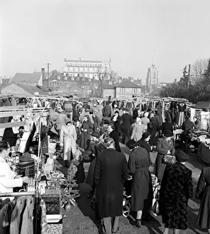 Stalls Prints: Busy scene showing shoppers and traders at Chelmsford Market in Essex. 28th November 1952