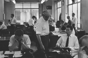 Busy scenes on the Daily Herald news desk, 1964