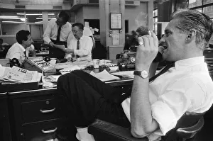 Busy scenes on the Daily Herald news desk, 1964