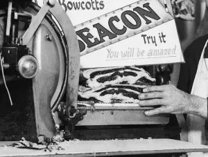 Meat Prints: Butcher cutting off Meat during the second World War II where food was rationed