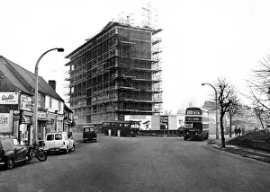 Buses Prints: The Butts-Spon Street junction dominated by the ten-storey block of flats which is being