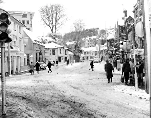 Bygones snow scene - New Road, Brixham at its town centre junction with Fore Street