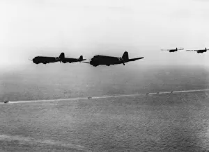 Airborne Prints: C-47 transport planes. Troop carrying planes of Ninth Air Force towing gliders