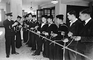 Recruitment Prints: Cadets under instructions by a Senior Officer learning how a bow-line knot is made