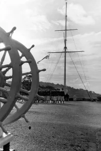 Cadets parade before the mast and ships wheel at the Royal Navys Suffolk training base
