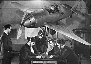 Instruction Prints: Cadets of the Wakefield 127 Squadron of the ATC give landing instructions to Corporal Don
