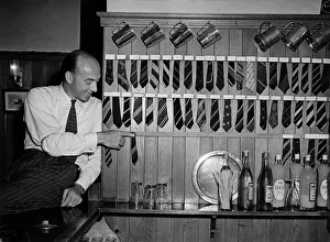 00030 Prints: Cads museum of old school ties. Alfred Moreland with his collection