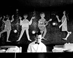 Eating Out Prints: The Cafe'in the Kings Road Chelsea with its Beatles mural Zola