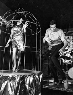 Caged dancer Pamela Christian, one of the girls setting the cagebird trend