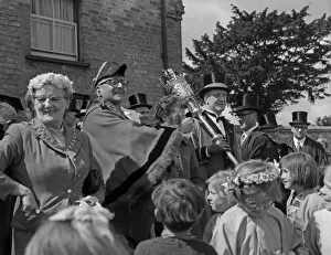 Fair Prints: Cambridge mayor Leonard D. V. Wordingham throws pennies to the children at the Reach