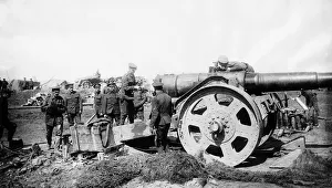 Canadian Prints: Canadian artillery men prepare a large naval gun 1917 for use on the Western Front